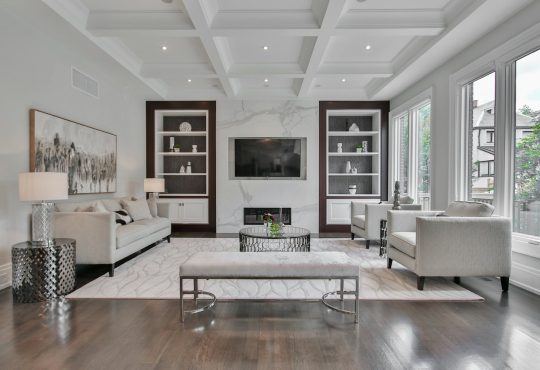 white-wooden-coffee-table-near-white-sofa