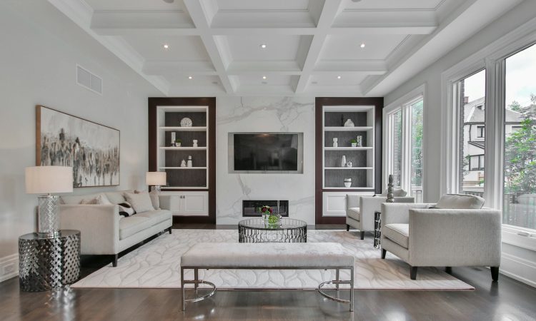 white-wooden-coffee-table-near-white-sofa